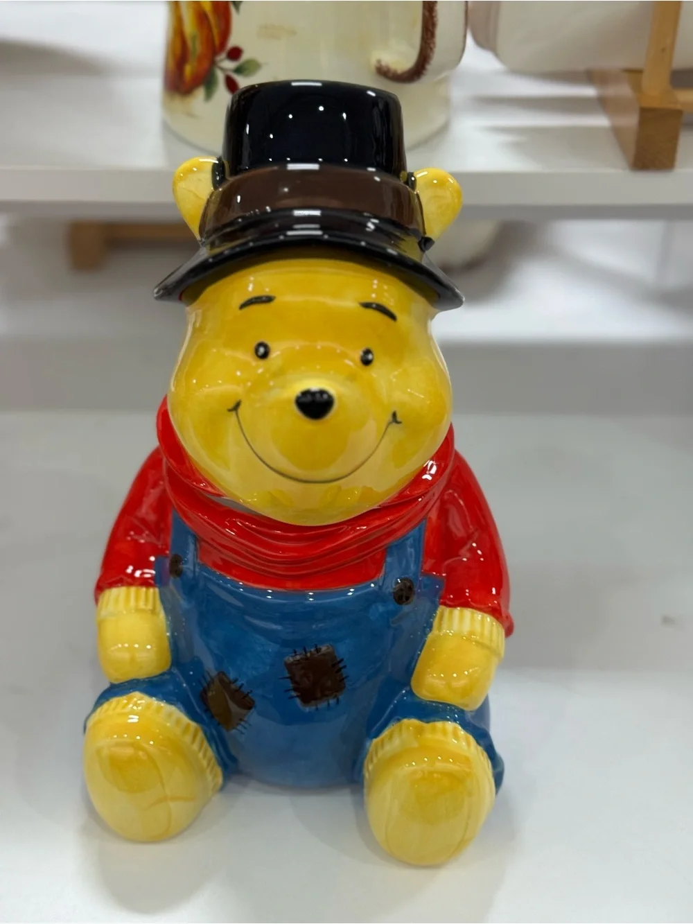 Disney winnie the pohh Bear Ceramic Figurine with Red Scarf and Blue Overalls